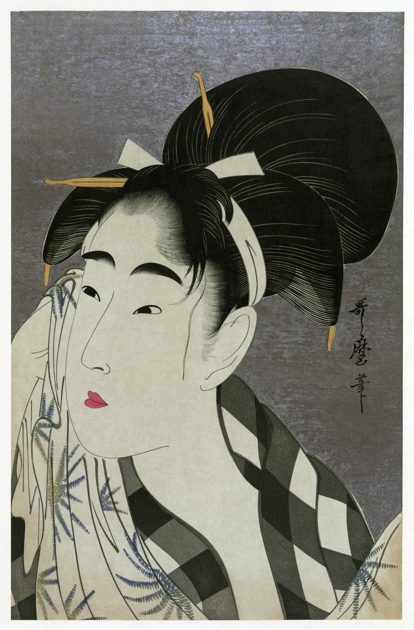 A stylized color woodblock-print portrait shows one woman in close-up, facing slightly left while holding a decorated folding hand fan beside her face. She has an elaborate black high updo with yellow and white hair ornaments, arched brows, partly closed eyes, pink lips, and a neutral expression. Her cream kimono has dark geometric bands and blue embroidered floral details against a plain gray background.